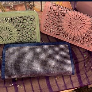 3brand new rhinestone wallets 2 are zip double sided and 1 is flip top wristlet
